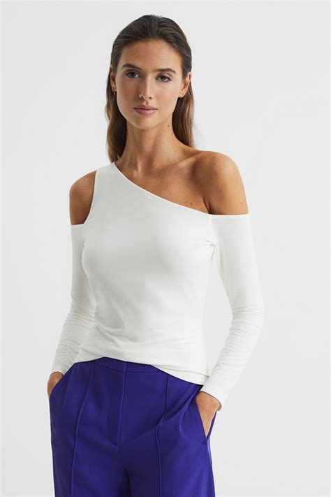 asymmetrical off the shoulder top.